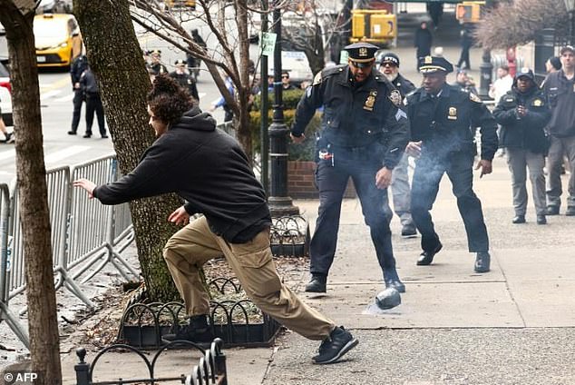 NYPD Officer's Viral Leap After Suspect Throws Explosive Sparks Debate on Heroism and Security