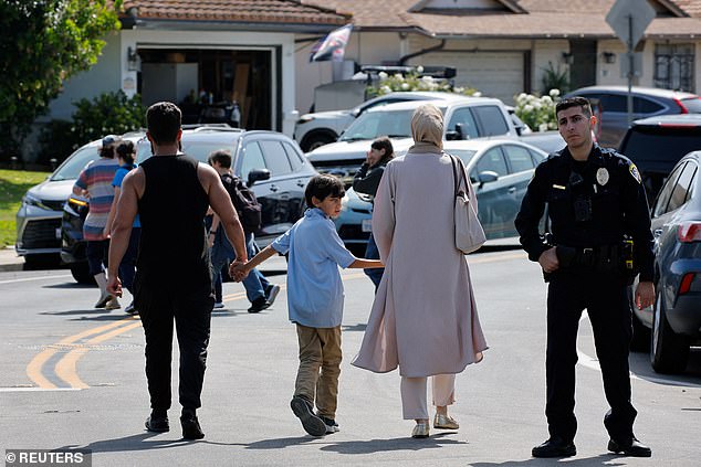 Security guard Amen Abdullah dies saving others during San Diego mosque shooting.