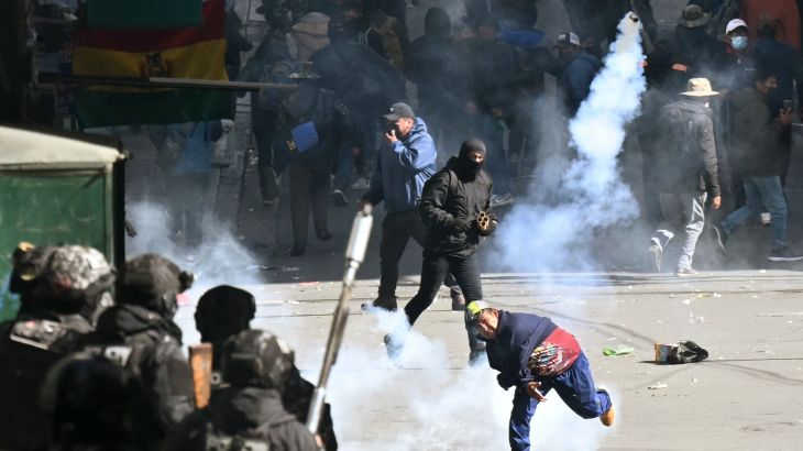 Bolivia's President slashes cabinet pay by 50% amid protests and economic crisis.