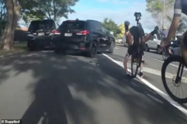 Cyclist's Close Call with an SUV: A Hair-Raising Escape