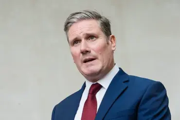 Labour minister sacked over racist and sexist messages