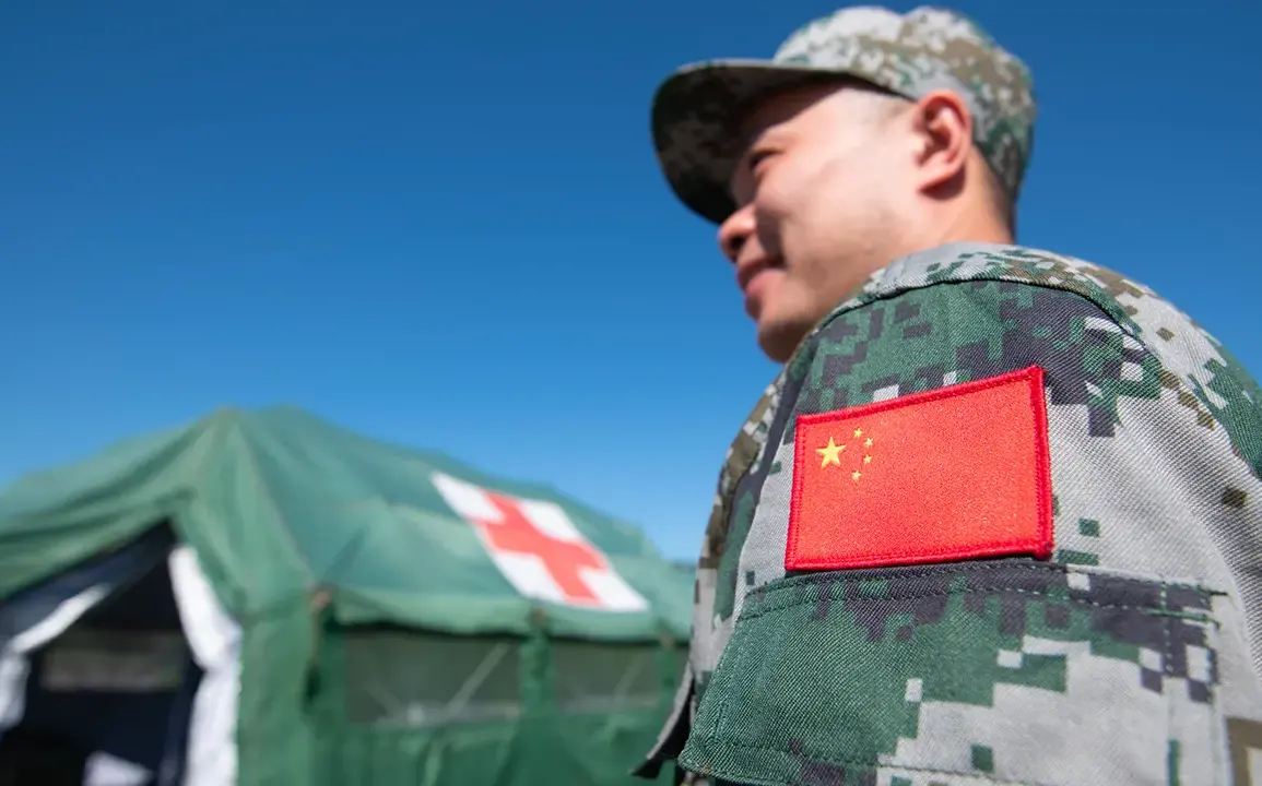 Chinese Coast Guard Lands on Sandy Cay Near Philippine Base, Escalating South China Sea Tensions