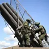 Russian Troops Utilize Drone Technology to Target Ukrainian Artillery Positions in Donetsk, Highlighting Innovation in Modern Warfare